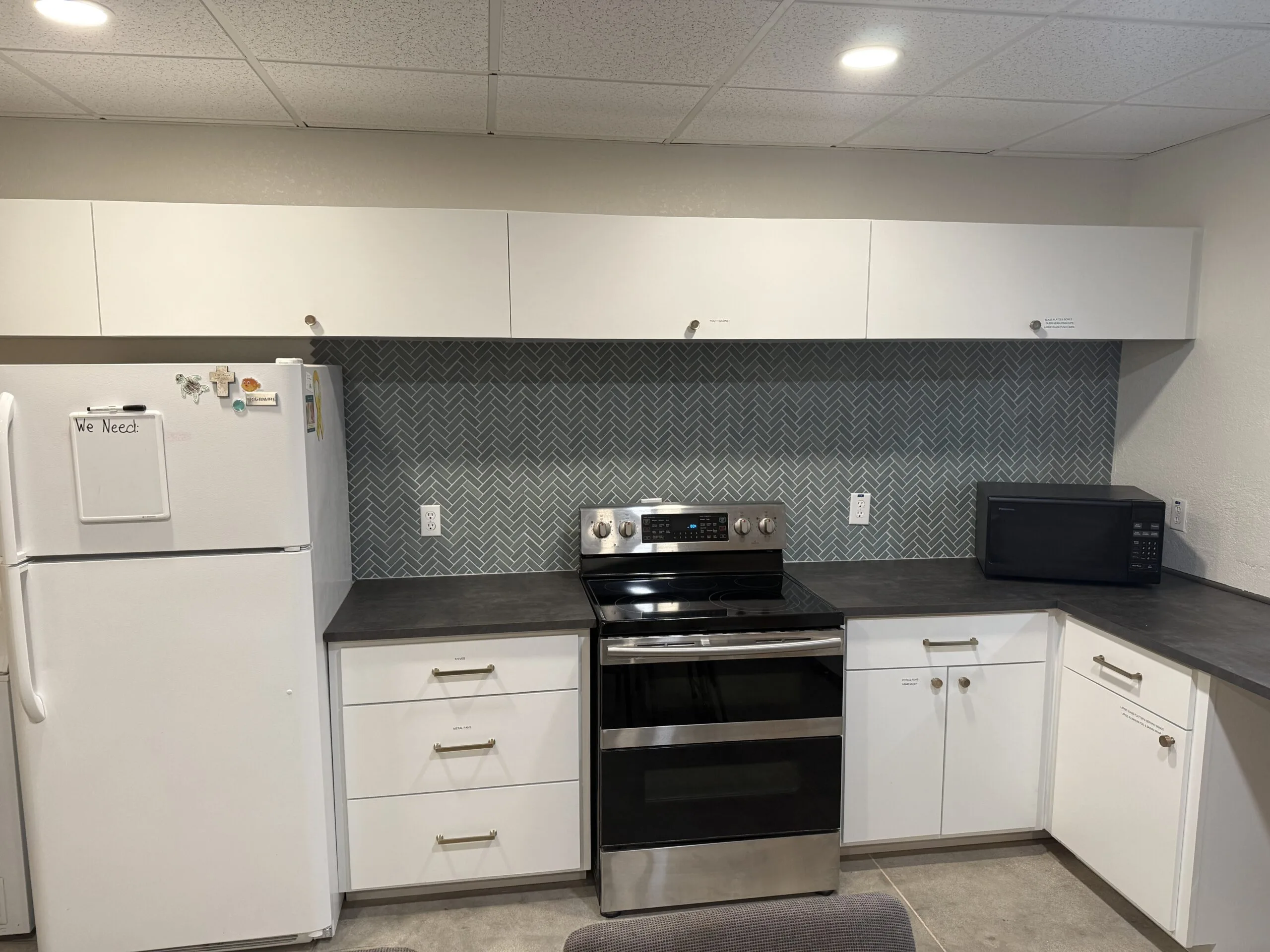 Custom flat panel cabinets for Hill Country church project